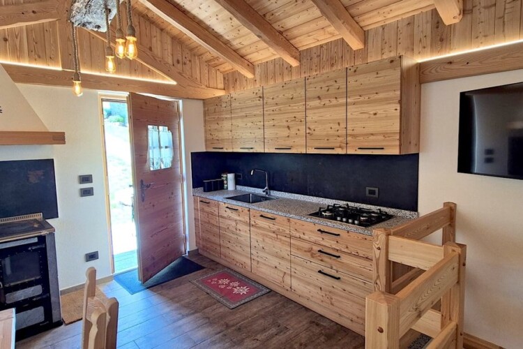 cucina in legno baita Jamon Caderzone Terme